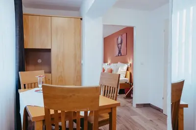 Ein Bett oder Betten in einem Zimmer der Unterkunft Hotel Angermeier GARNI