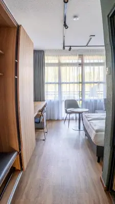 Ein Bett oder Betten in einem Zimmer der Unterkunft Sportschule Oberhaching