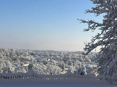 Alpenchalet Kogel - Blick auf Tölz und ins Karwendel im Winter