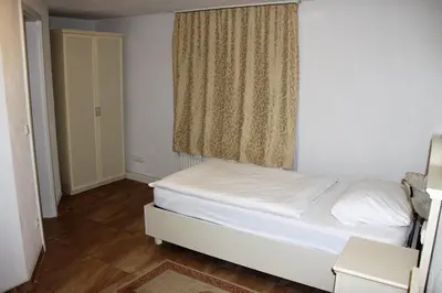 Ein Bett oder Betten in einem Zimmer der Unterkunft Hotel Villa Toscana