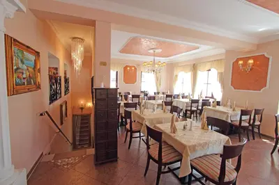 Ein Sitzbereich in der Unterkunft Hotel Villa Toscana