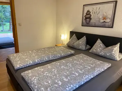 Ein Bett oder Betten in einem Zimmer der Unterkunft Ferienhaus Veronika mit 2000qm Garten und Bergblick