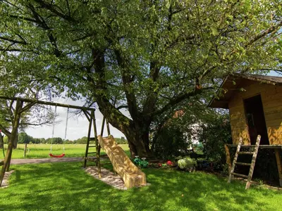 Ein Garten an der Unterkunft Gemütliches Ferienwohnung in Feldwies mit Sauna