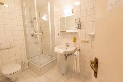 Ein Badezimmer in der Unterkunft Ammergau Lodge