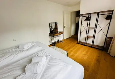 Ein Bett oder Betten in einem Zimmer der Unterkunft Apartment Schliersee - Stylisch, zentral, familienfreundlich