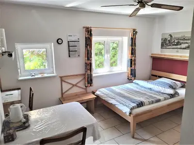 Ein Bett oder Betten in einem Zimmer der Unterkunft Highland Accommodation Bavaria