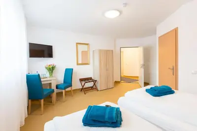 Ein Bett oder Betten in einem Zimmer der Unterkunft Hotel Ludwig
