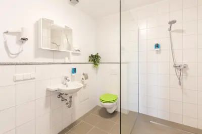 Ein Badezimmer in der Unterkunft Hotel Ludwig