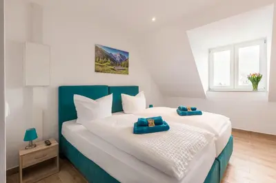 Ein Bett oder Betten in einem Zimmer der Unterkunft Hotel Ludwig