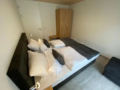 Ein Bett oder Betten in einem Zimmer der Unterkunft Ferienwohnung Preisinger