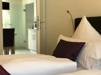 Ein Bett oder Betten in einem Zimmer der Unterkunft Ferienwohnung Preisinger