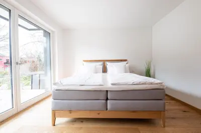 Ein Bett oder Betten in einem Zimmer der Unterkunft Riverside