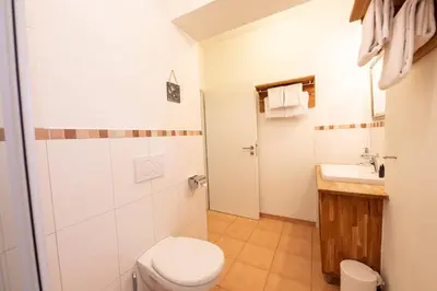 Ein Badezimmer in der Unterkunft zum Draxla in Partenkirchen