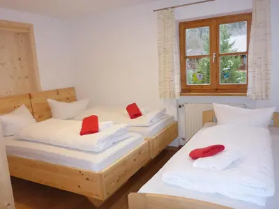 Ein Bett oder Betten in einem Zimmer der Unterkunft Ferienwohnung Uferweg