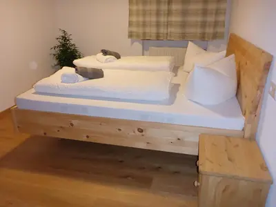 Ein Bett oder Betten in einem Zimmer der Unterkunft Ferienwohnung Uferweg