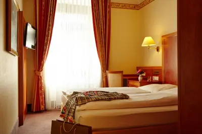 Ein Bett oder Betten in einem Zimmer der Unterkunft Hotel Concorde