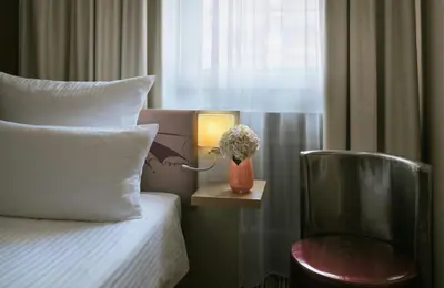 Ein Bett oder Betten in einem Zimmer der Unterkunft Leonardo Boutique Hotel Munich