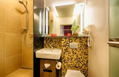 Ein Badezimmer in der Unterkunft Leonardo Hotel & Residenz Muenchen