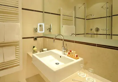 Ein Badezimmer in der Unterkunft Hotel Torbräu