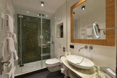 Ein Badezimmer in der Unterkunft Hotel Torbräu