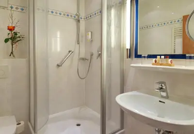 Ein Badezimmer in der Unterkunft Hotel Torbräu