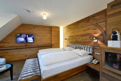 Ein Bett oder Betten in einem Zimmer der Unterkunft Hotel Torbräu