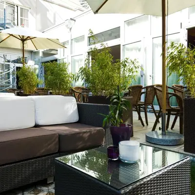 Ein Sitzbereich in der Unterkunft Hotel Europa