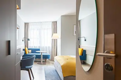 Ein Sitzbereich in der Unterkunft Hotel Europa