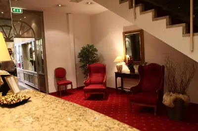 Ein Sitzbereich in der Unterkunft Hotel Ambiente Garni