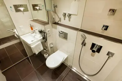 Ein Badezimmer in der Unterkunft Hotel Antares München