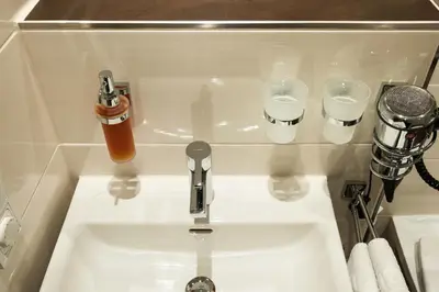 Ein Badezimmer in der Unterkunft Hotel Antares München