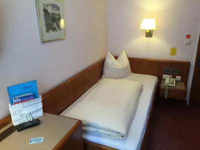 Ein Bett oder Betten in einem Zimmer der Unterkunft Hotel Carmen