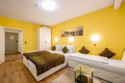Ein Bett oder Betten in einem Zimmer der Unterkunft Hotel Rivoli Charme
