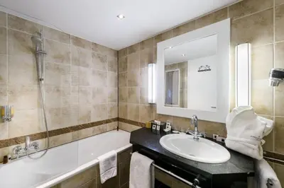 Ein Badezimmer in der Unterkunft Hotel Rivoli Charme
