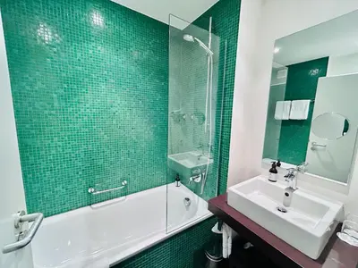 Ein Badezimmer in der Unterkunft Hotel Erzgiesserei Europe