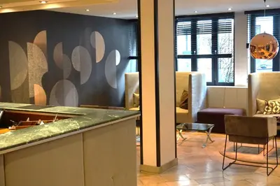 Ein Sitzbereich in der Unterkunft Hotel Erzgiesserei Europe
