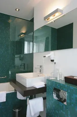 Ein Badezimmer in der Unterkunft Hotel Erzgiesserei Europe
