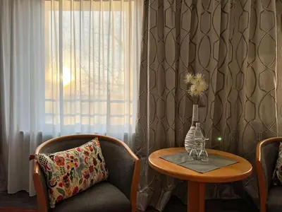 Ein Sitzbereich in der Unterkunft Hotel Prinz