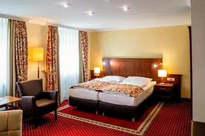Ein Bett oder Betten in einem Zimmer der Unterkunft Europäischer Hof