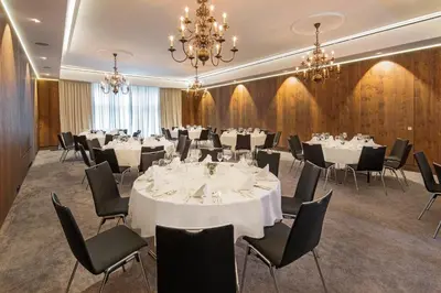 Ein Sitzbereich in der Unterkunft Eden Hotel Wolff