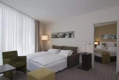 Ein Bett oder Betten in einem Zimmer der Unterkunft Holiday Inn Munich Unterhaching by IHG