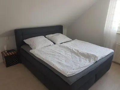 Ein Bett oder Betten in einem Zimmer der Unterkunft 50 Quadratmeter abgeschlossene Wohnung mit Panoramablick