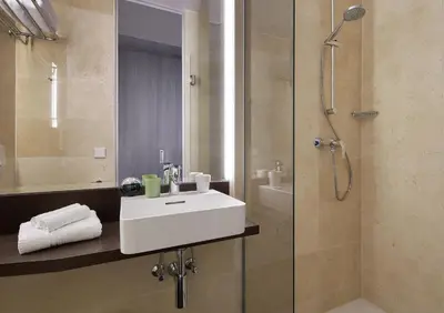 Ein Badezimmer in der Unterkunft Living Hotel am Olympiapark