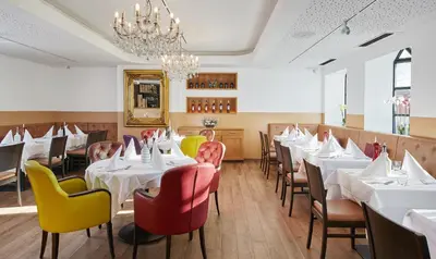Ein Sitzbereich in der Unterkunft Living Hotel am Olympiapark
