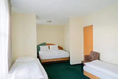 Ein Bett oder Betten in einem Zimmer der Unterkunft Trip Inn Hotel Dasing-Augsburg