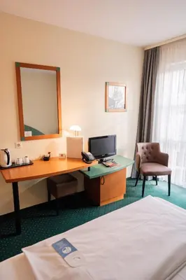 Ein Bett oder Betten in einem Zimmer der Unterkunft Trip Inn Hotel Dasing-Augsburg