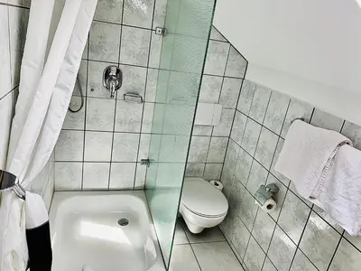 Ein Badezimmer in der Unterkunft Gästehaus Hohe Tannen