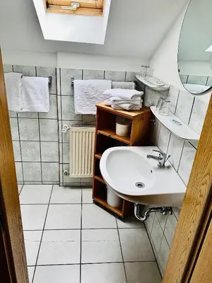 Ein Badezimmer in der Unterkunft Gästehaus Hohe Tannen