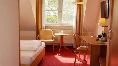 Ein Sitzbereich in der Unterkunft Hotel Alarun Munich by Mayburgh