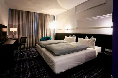 Ein Bett oder Betten in einem Zimmer der Unterkunft Hotel Schempp